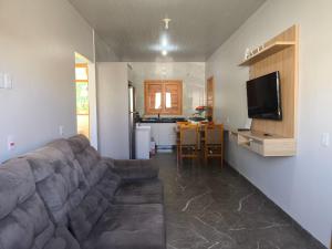 Televiisor ja/või meelelahutuskeskus majutusasutuses Casa aconchego em Foz do Iguaçu