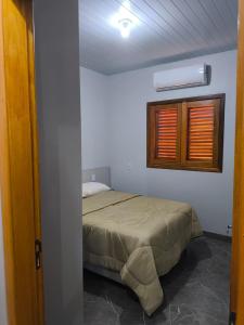 Voodi või voodid majutusasutuse Casa aconchego em Foz do Iguaçu toas