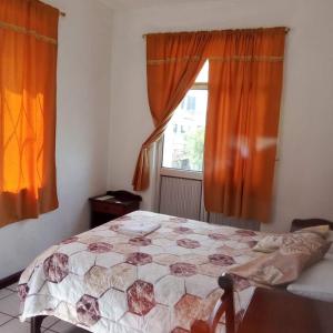 Postel nebo postele na pokoji v ubytování Hostal Almagro