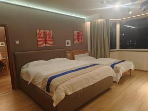 Postel nebo postele na pokoji v ubytování Apartment Champs Elysees
