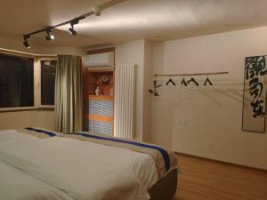 Postel nebo postele na pokoji v ubytování Apartment Champs Elysees