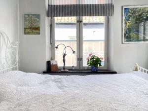 Voodi või voodid majutusasutuse Holiday home SIMRISHAMN toas