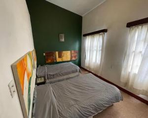Postel nebo postele na pokoji v ubytování Casa Madero Rooms