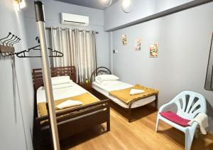 Postel nebo postele na pokoji v ubytování Bayu Beach Resort PortDickson Santai PD Homestay 2 Rooms Apartment + 8 fotografií