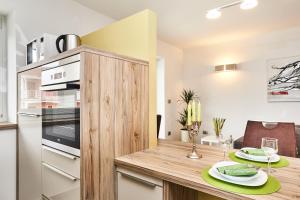 Kuchyň nebo kuchyňský kout v ubytování Apartments Tre Perle