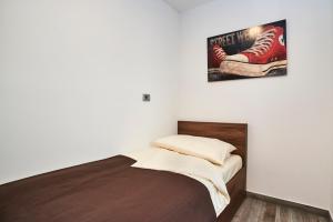 Postel nebo postele na pokoji v ubytování Apartments Tre Perle