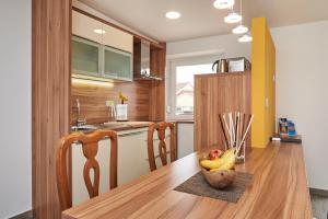 Kuchyň nebo kuchyňský kout v ubytování Apartments Tre Perle