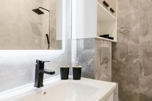 Koupelna v ubytování ЖК Respublica + 22 fotografií