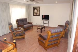 Μια τηλεόραση ή/και κέντρο ψυχαγωγίας στο Charming Self Catering Apartment