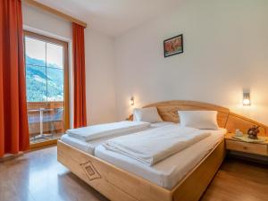 Una cama o camas en una habitación de Apartment in Neustift near Ski Lift, cleaning included
