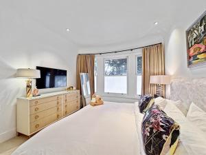 Ένα ή περισσότερα κρεβάτια σε δωμάτιο στο Fabulous 3 Bed Flat For Long Stays