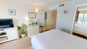 Voodi või voodid majutusasutuse Islander Beach Resort 303 toas