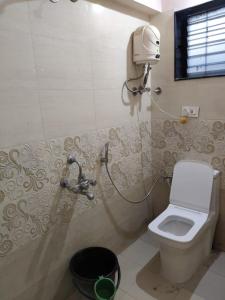 Ένα μπάνιο στο Jyotiba guest house