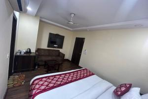 Postel nebo postele na pokoji v ubytování HOTEL SINGH CONTINETAL