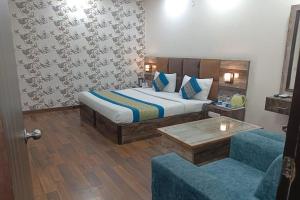 Postel nebo postele na pokoji v ubytování HOTEL SINGH CONTINETAL