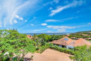an aerial view of a house with trees at Phezulu Villas 2, Zimbali Estate by Euphoric Leisure in Ballito