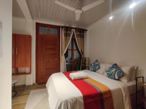 Voodi või voodid majutusasutuse Palm Lagoon toas