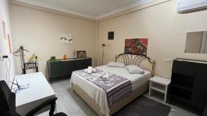 Postel nebo postele na pokoji v ubytování Guest House Kldiashvili