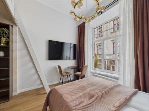 Μια τηλεόραση ή/και κέντρο ψυχαγωγίας στο Loft Studio in Heart Old Town Riga