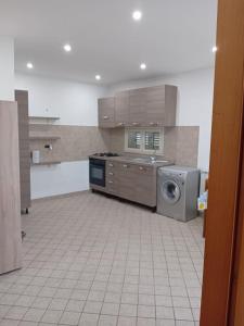 Η κουζίνα ή μικρή κουζίνα στο Casa marino monolocale