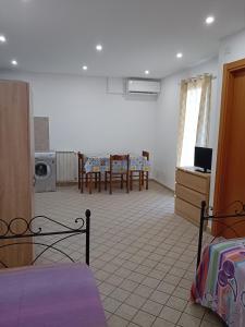 Ένα ή περισσότερα κρεβάτια σε δωμάτιο στο Casa marino monolocale