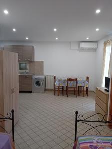 Η κουζίνα ή μικρή κουζίνα στο Casa marino monolocale
