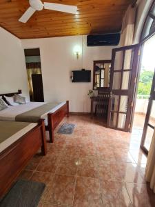 TV a/nebo společenská místnost v ubytování Resort Khana