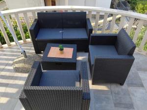 Posedenie v ubytovaní Melita Apartements