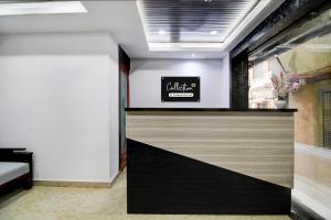 a lobby with a sign on the wall at Super Collection O Chinar Park Near Airport in Kolkata