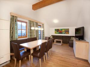 Télévision ou salle de divertissement dans l'établissement Apartment in Wald im Pinzgau with Swimming Pool and Views