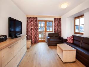 Télévision ou salle de divertissement dans l'établissement Apartment in Wald im Pinzgau with Swimming Pool and Views