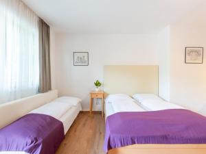 Ένα ή περισσότερα κρεβάτια σε δωμάτιο στο Property in Kirchbichl