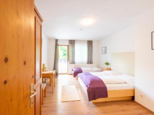 Ένα ή περισσότερα κρεβάτια σε δωμάτιο στο Property in Kirchbichl