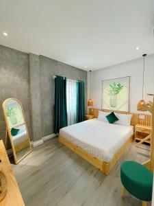 Ένα ή περισσότερα κρεβάτια σε δωμάτιο στο PuLin Homestay