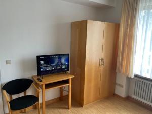 TV a/nebo společenská místnost v ubytování Klosterhof Neustadt am Main