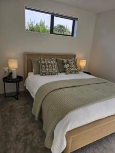 Ένα ή περισσότερα κρεβάτια σε δωμάτιο στο Courtenay Street Abode