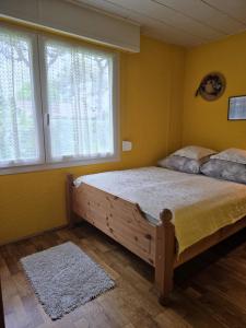 Postel nebo postele na pokoji v ubytování Gerhards Strandhaus Seaside Bungalow