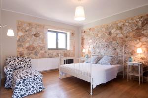 A bed or beds in a room at Villa Unique