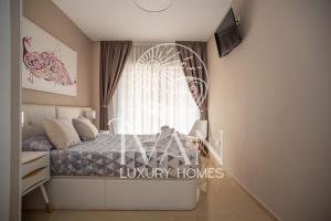 Posteľ alebo postele v izbe v ubytovaní Casa Miriam Ivan Luxury Homes 2ªPlta Sur 1ªLinea