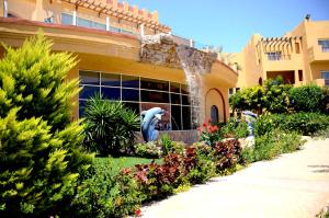 A garden outside Rehana Royal Beach Resort - Aquapark & Spa - Family & Couples Only - Premium Ultra All-Inclusive 24H