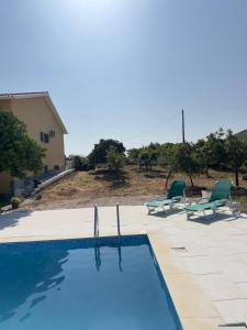 Swimmingpoolen hos eller tæt på Casa da Alegria - Piscina, Sala de Jogos, 4 Quartos