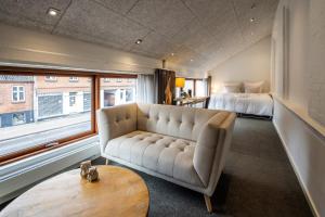 Postel nebo postele na pokoji v ubytování Hotel Birksø