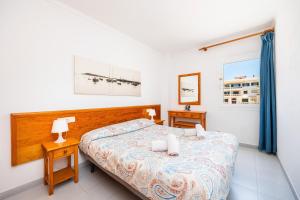 Postel nebo postele na pokoji v ubytování Can Vidal Formentera