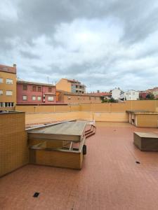 a building with awning on top of a roof at Rincon Confort in Villamediana de Iregua
