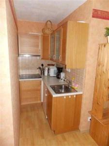 Η κουζίνα ή μικρή κουζίνα στο Ferienwohnung Laura F-I-3-4 +5 φωτογραφίες
