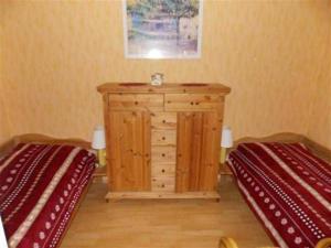 Ένα ή περισσότερα κρεβάτια σε δωμάτιο στο Ferienwohnung Laura F-I-3-4