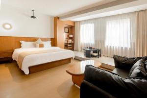 Postel nebo postele na pokoji v ubytování Tuji Lane and Fanghe Homestay (West Street Kaiyuan Temple Branch)