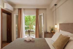 Postel nebo postele na pokoji v ubytování Sueno Garden Apartment