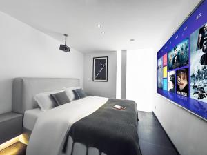 Voodi või voodid majutusasutuse Time Wharf Hotel - Jiefangbei Shibati Branch toas