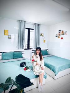 Postel nebo postele na pokoji v ubytování Dona Hotel + 2 fotografie